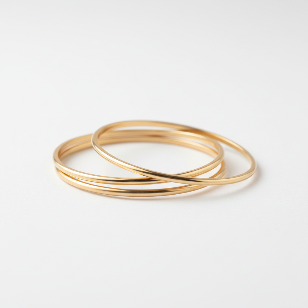 Set de 3 pulseras doradas bangle apilables